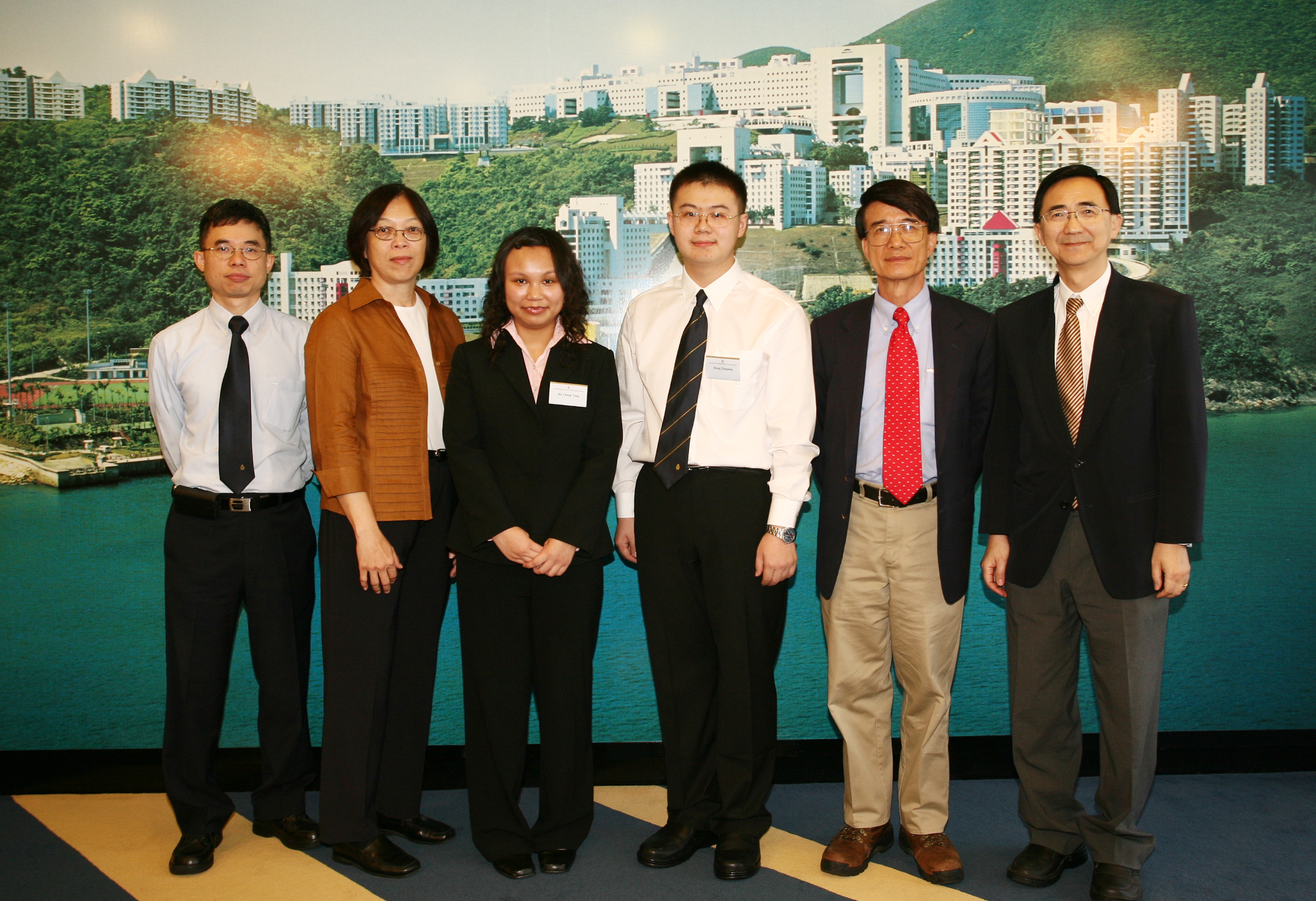 President Paul Chu and his wife Mrs May Chu made a donation of HK$ 1 million to honor two winning Physics students, Miss Ho Cheuk Ting, Cherry and Mr Hong Xiaoping. Their project advisors, Prof Chan Che Ting (first from left) and Prof Michael Loy (first from right) also present at the ceremony to share the happiness.