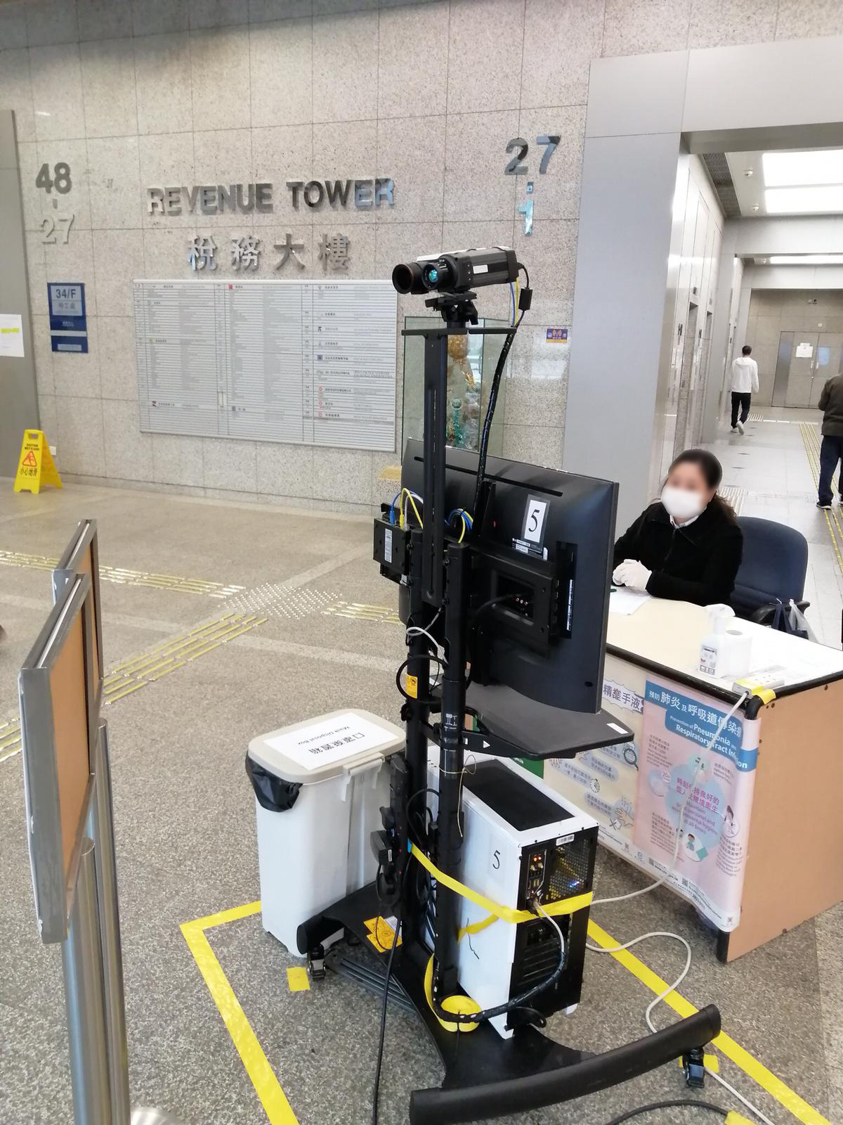 To facilitate government’s operation, the SFSS system (left) deployed at control points and government facilities are adjusted to display only the fevered suspects in red brackets, but not non fevered person in green brackets.