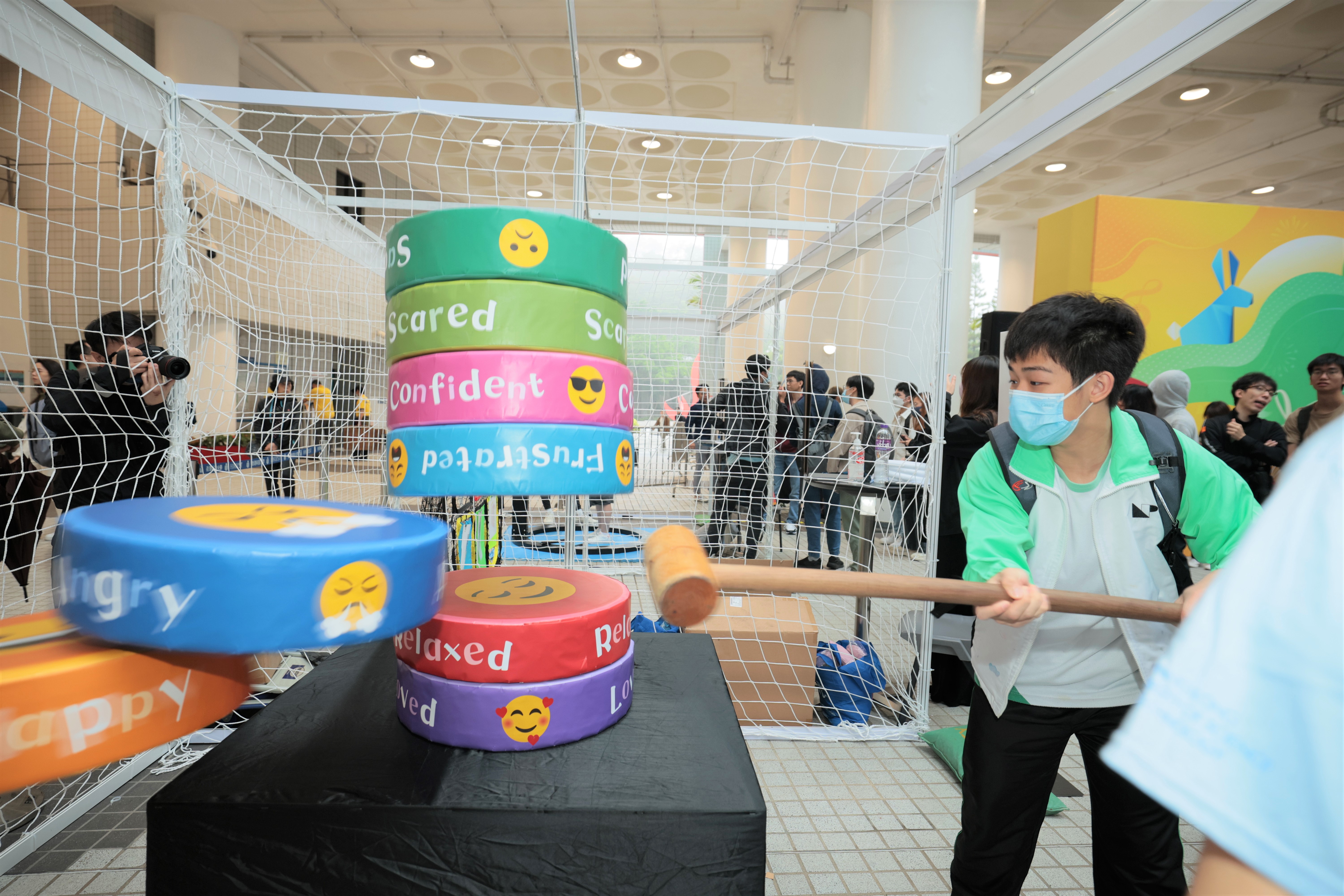 Participants take part in a variety of game booths and make their own red bird origamis 