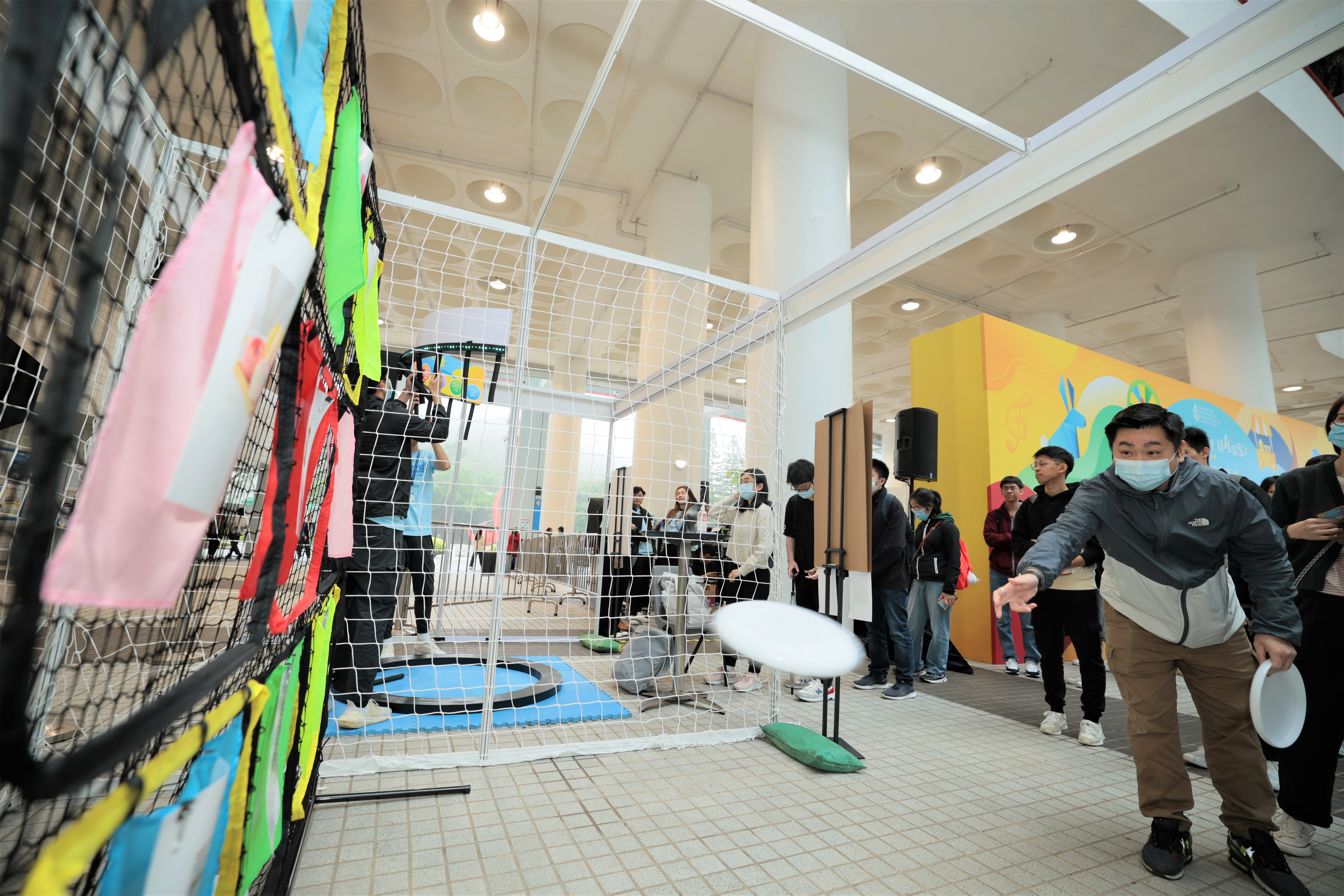 Participants take part in a variety of game booths and make their own red bird origamis 