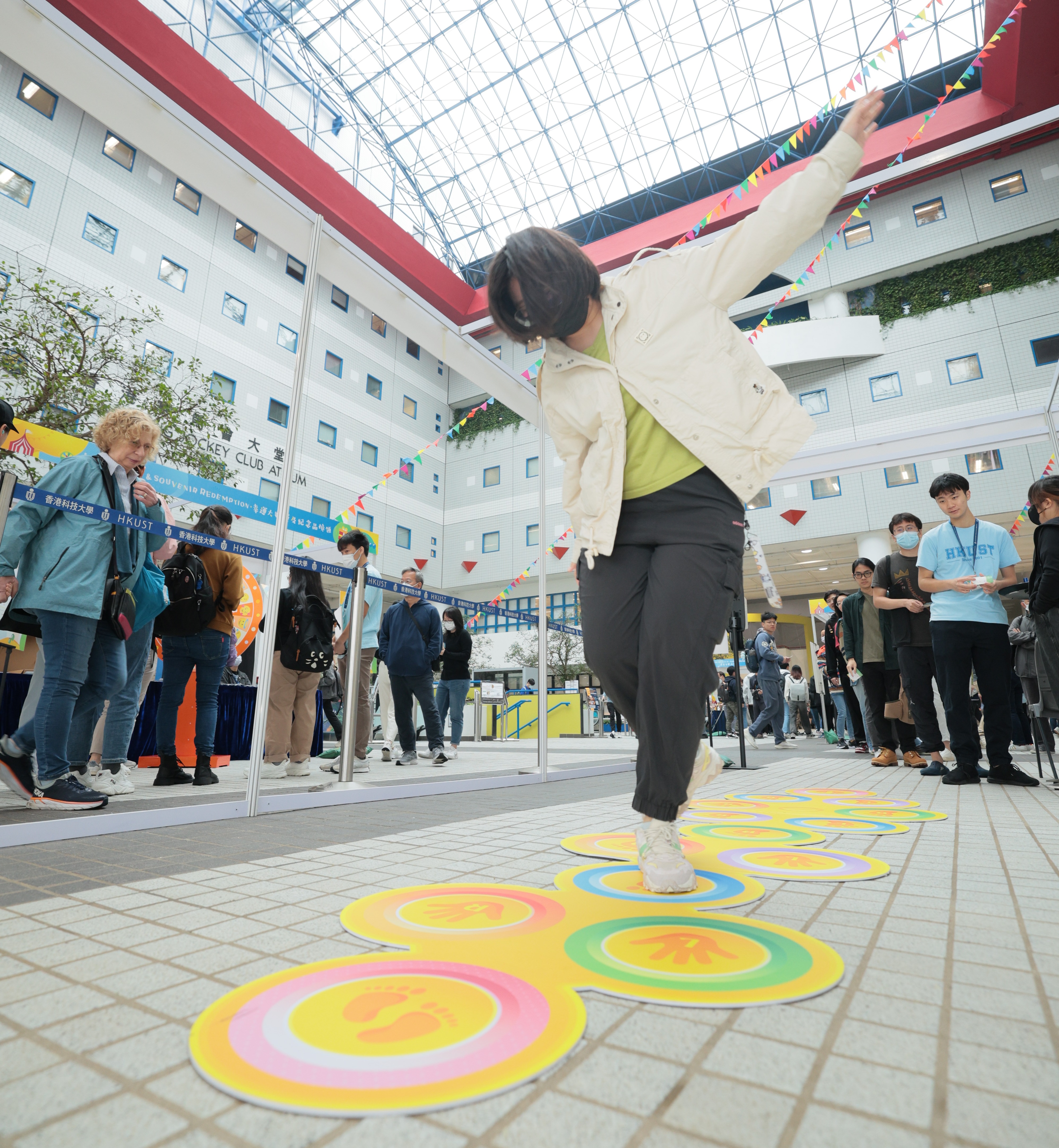 Participants take part in a variety of game booths and make their own red bird origamis 