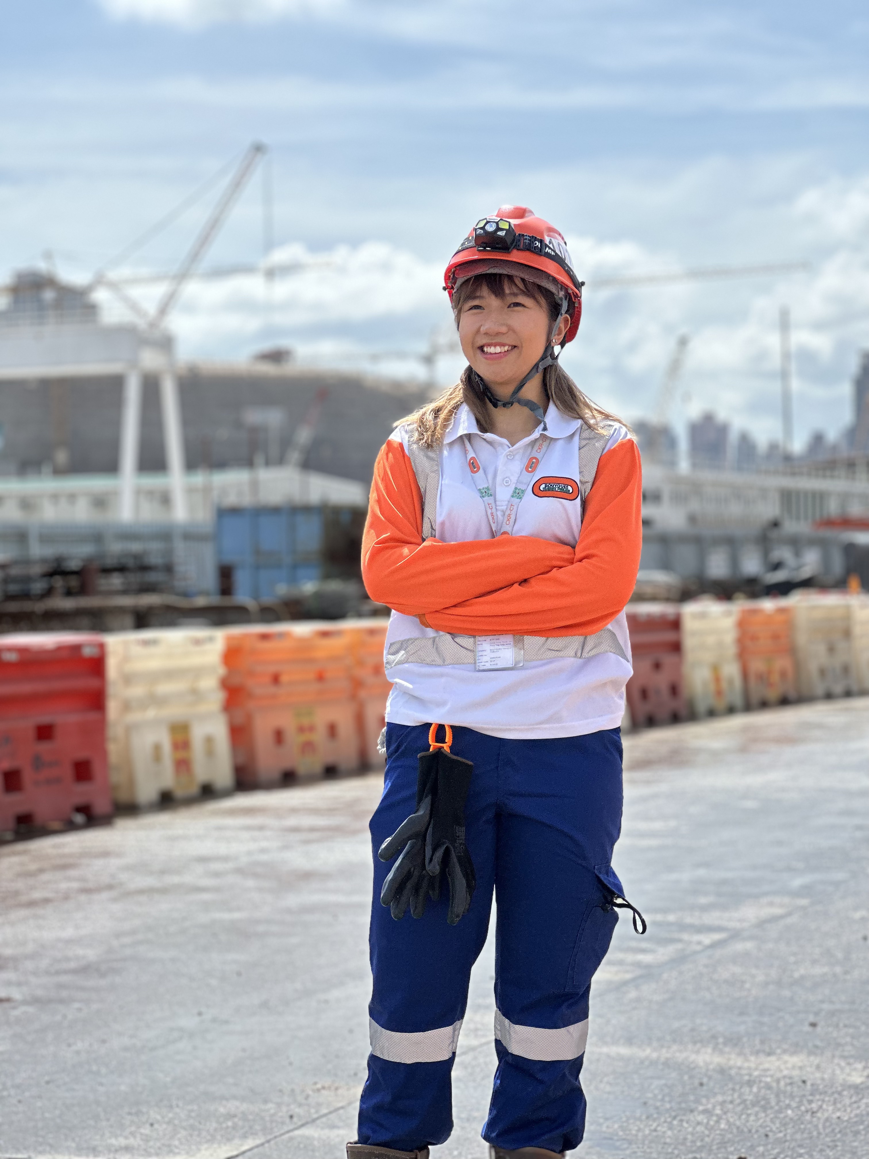 HKUST Civil Engineering graduate Janice PANG wearing uniform and helmet.