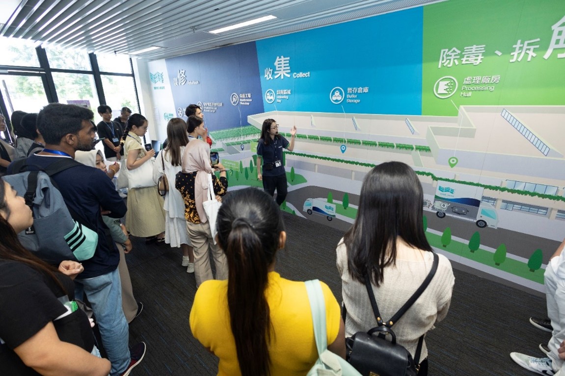 Participants visit the WEEEpark, Hong Kong's pioneering waste electrical and electronic equipment (WEEE) recycling facility.