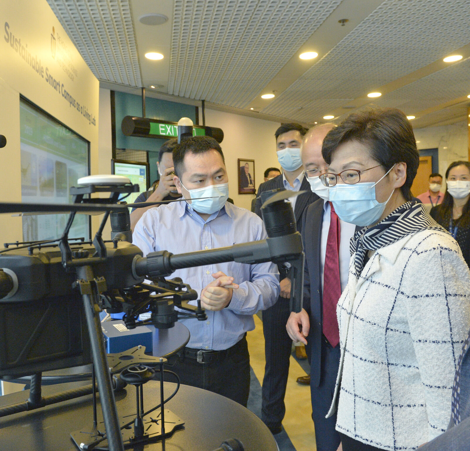 Prof. Ning Zhi (left) introduces how drones can be used to check vessel emissions.