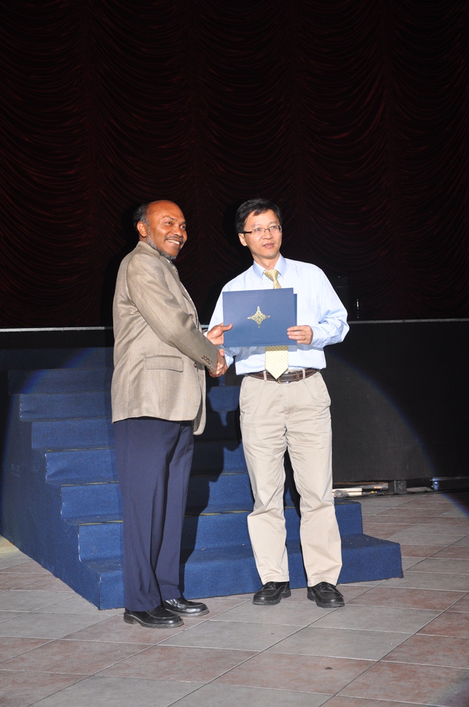  Prof Bing Zeng (right) receives the CSVT Transactions Best Paper Award