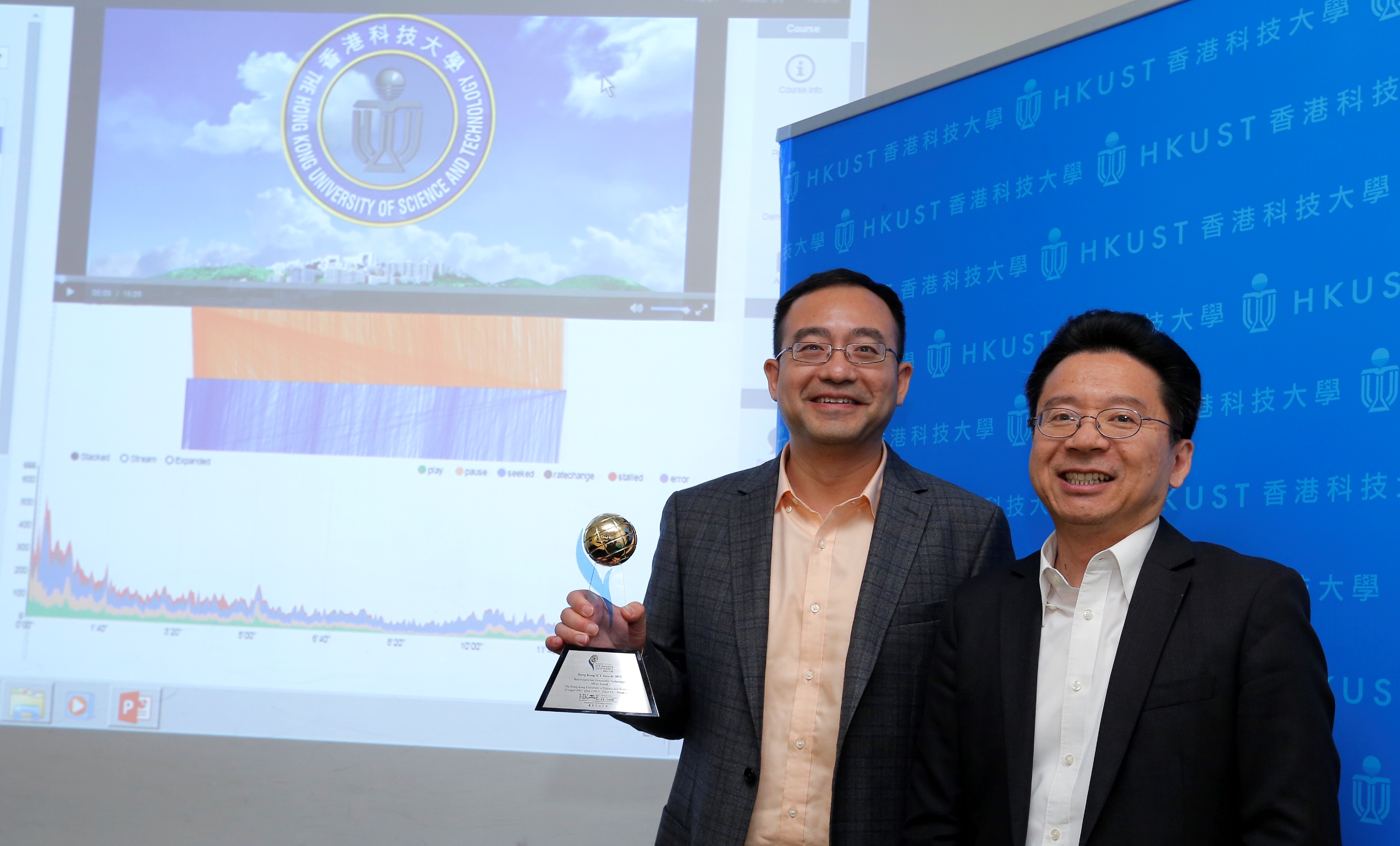  屈华民教授(左)和庞鼎全教授。