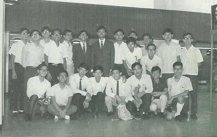  Prof Chan, suited up and studious (back row, 6th from left) at Queen's College in 1970, before leaving for studies in the US.