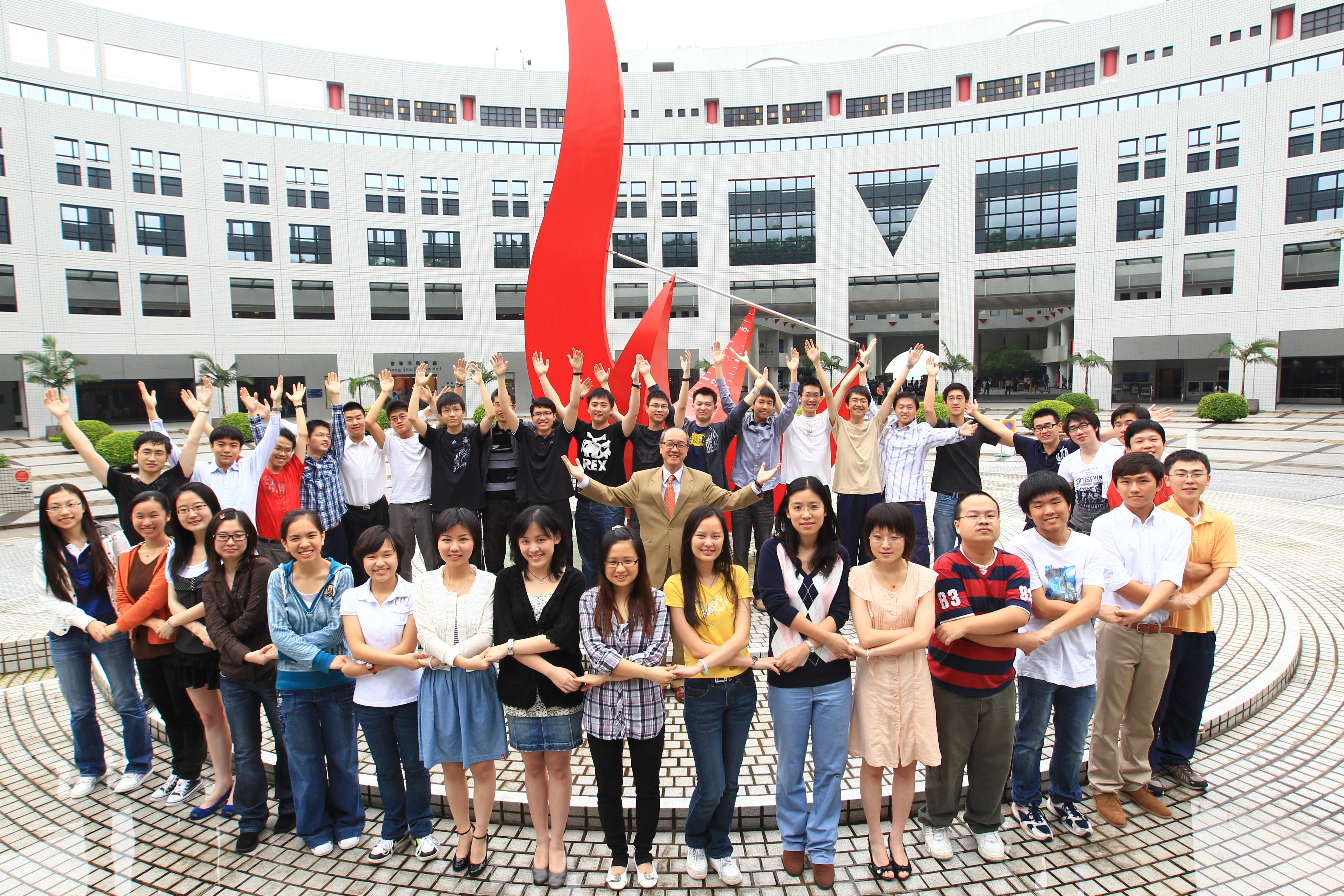  Hand in hand, heart in heart, the award winners prepare to soar high in the realm of academic research.