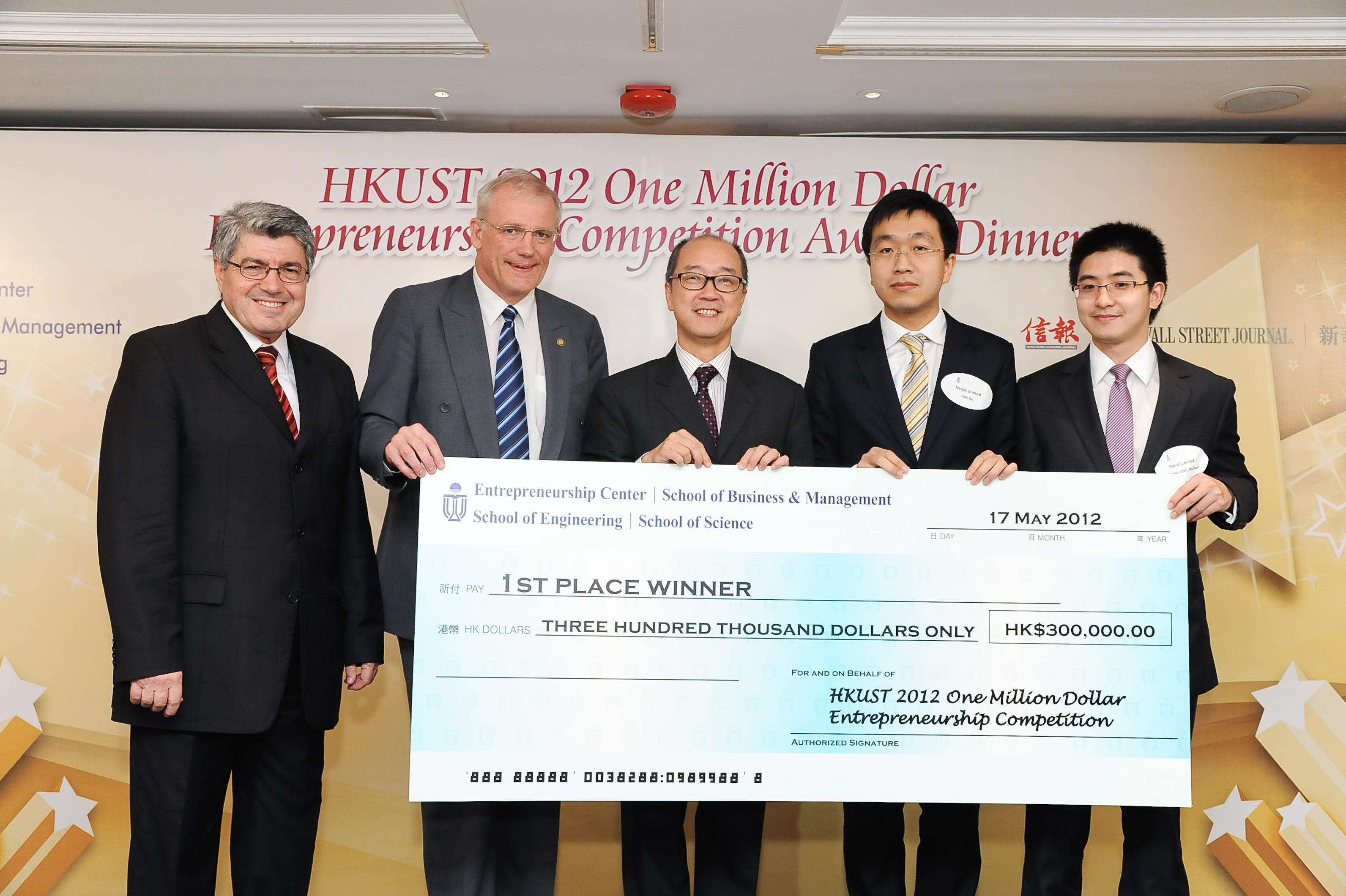 HKUST President Tony F Chan (middle) presents award to Neoid Limited, the Champion of the HKUST One Million Dollar Entrepreneurship Competition. Prof Ali Beba (left) and Senior Associate Dean of Business Prof Steven DeKrey (2nd from left) are present.