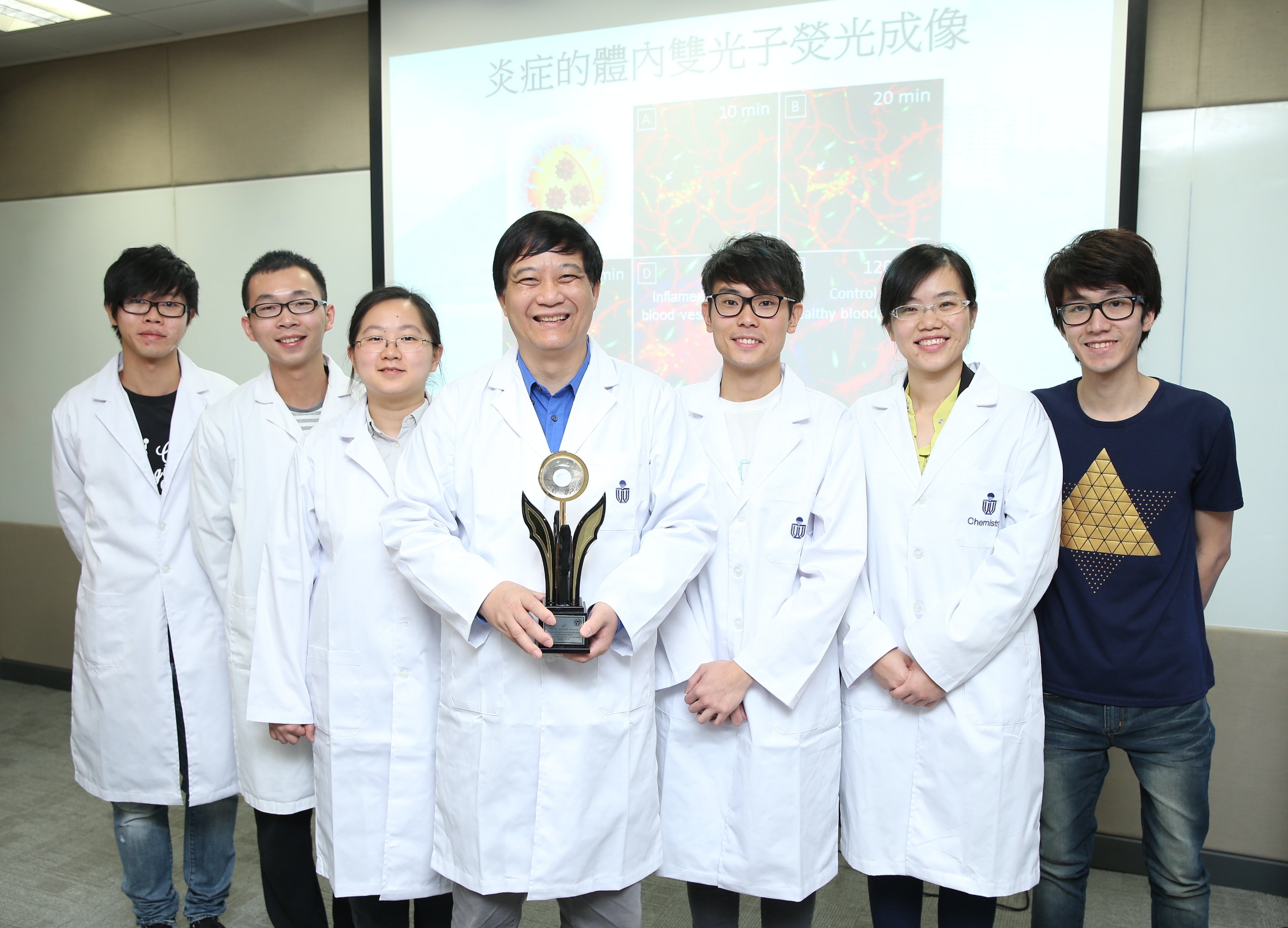  Prof Ben Zhong Tang (middle) and his research team.