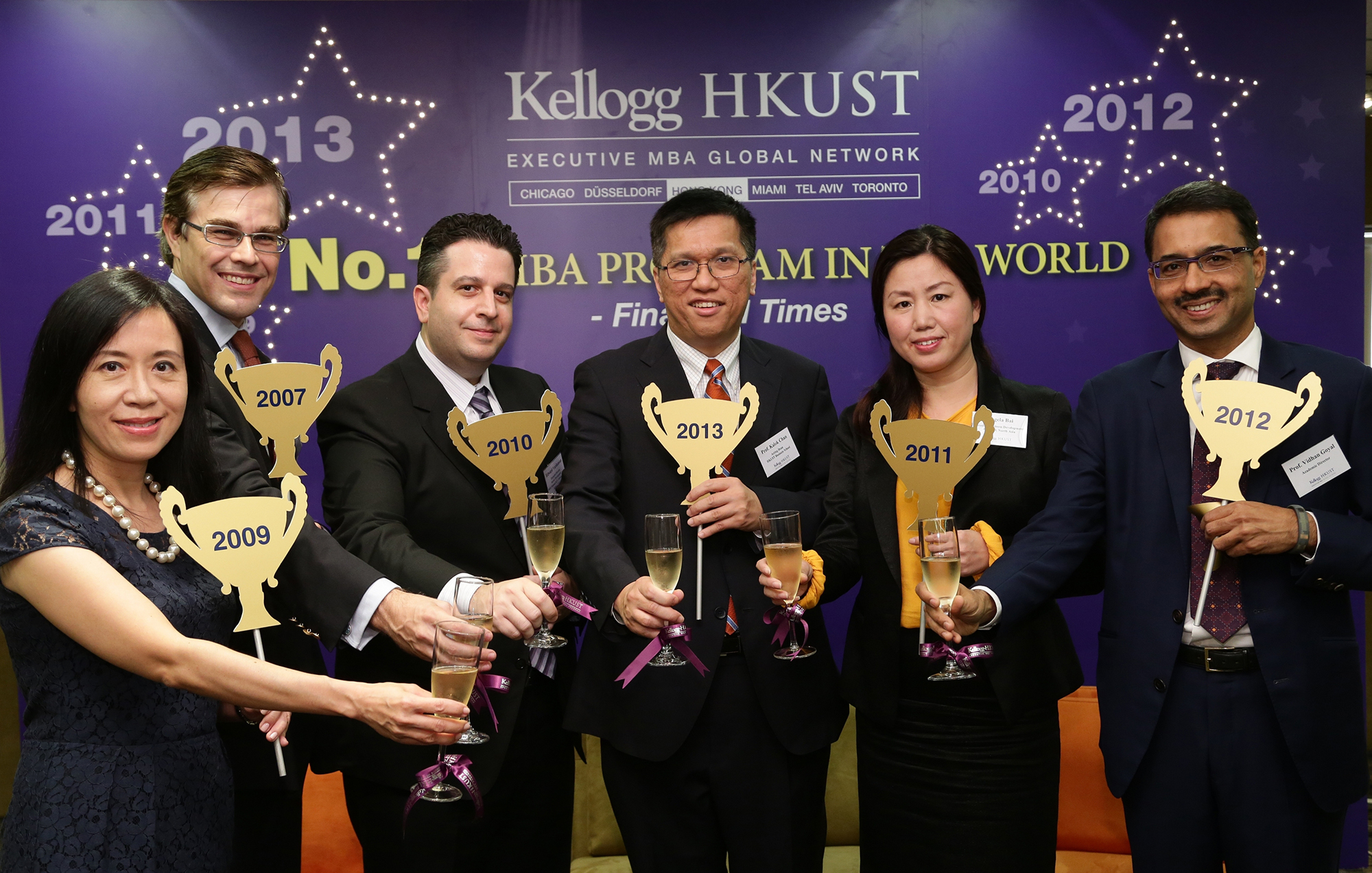  Acting Dean Kalok Chan (center), Prof Vidhan Goyal, Academic Director (1st from right), Prof Christopher Doran, Deputy Academic Director (2nd from left), and Judy Au, Program Director, KH-EMBA (1st from left), celebrate the No 1 ranking with alumni of the 2010 graduating class: Angela Bai, Head of Business Development, North Asia, FEXCO (2nd from right), and Edward Yardumian, Executive Director, Server Development, Dell (Taiwan) B.V. Taiwan Branch.