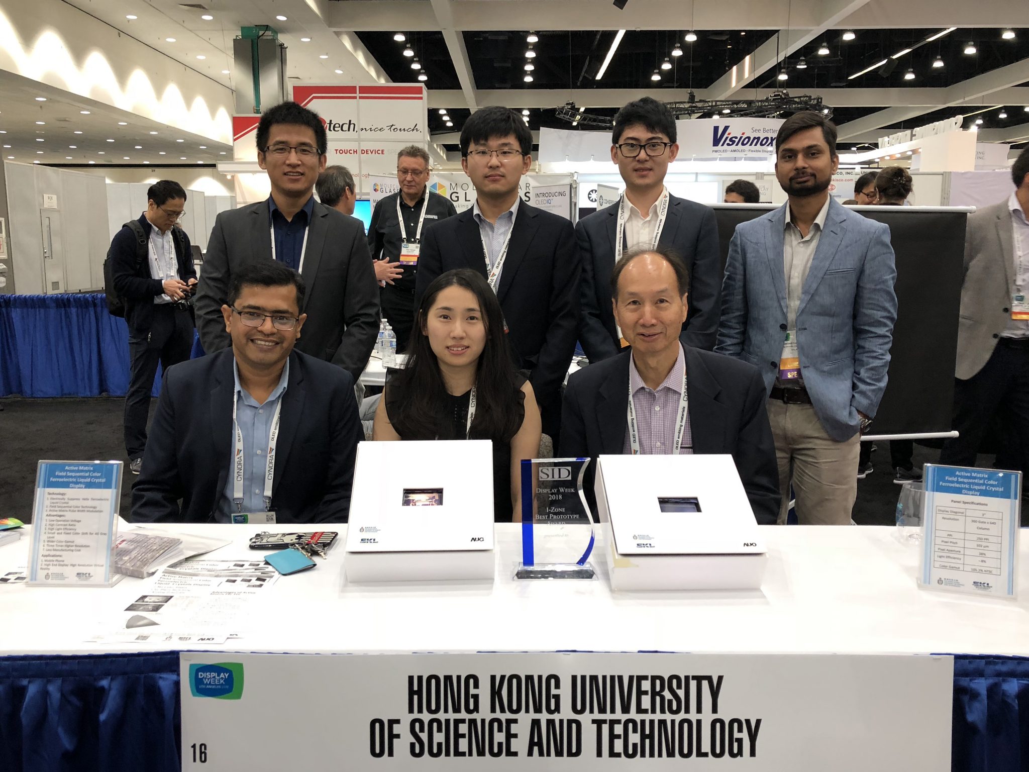  The team led by Chair Prof Kwok (front right) and Assistant Prof Abhishek Srivastava (front left) from the Department of Electronic and Computer Engineering won the “Best Prototype in Innovation Zone” award from The Society for Information Display with the new display technology