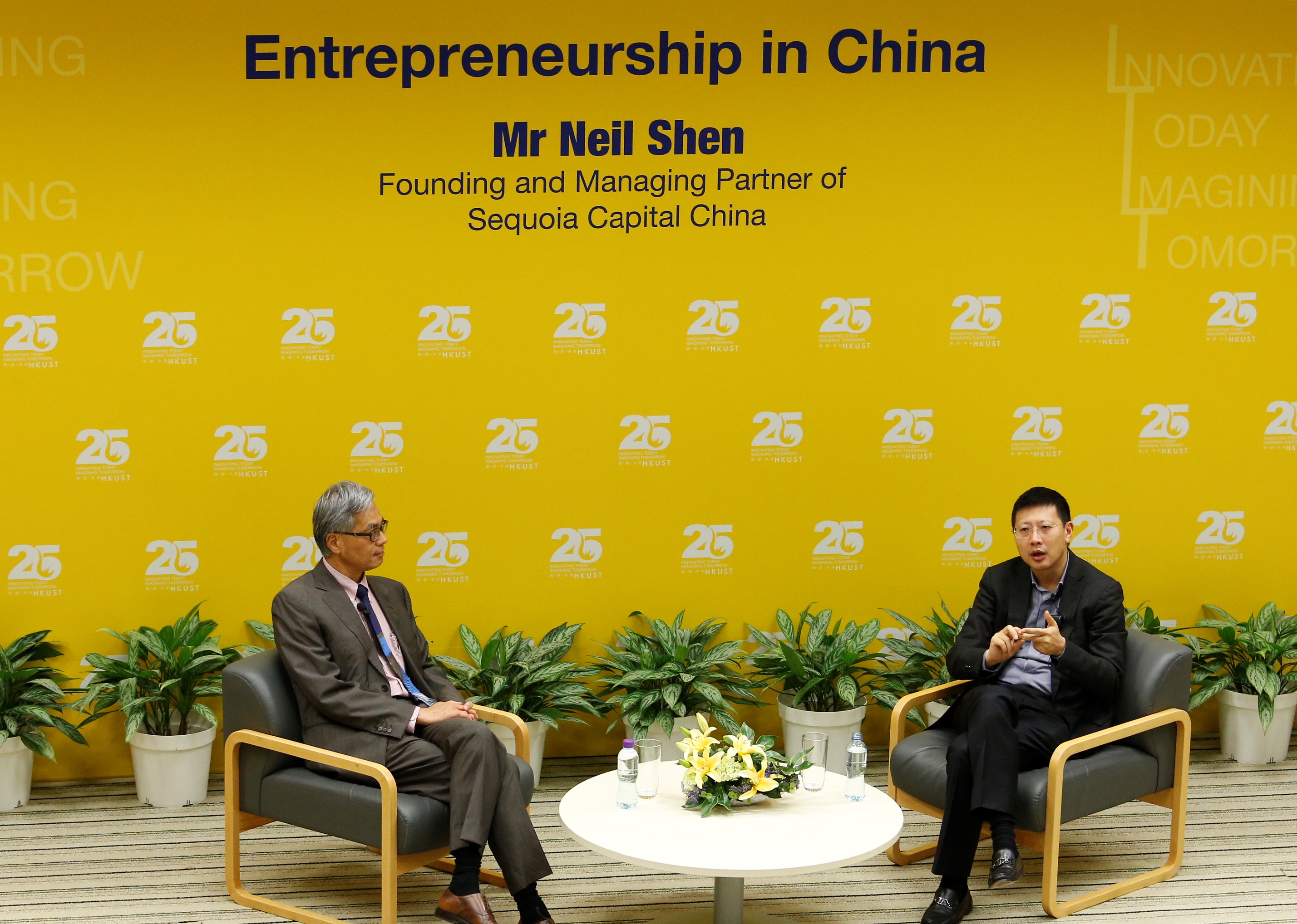  A discussion between Mr Neil Shen (right) and Executive Vice-President and Provost Prof Wei Shyy.