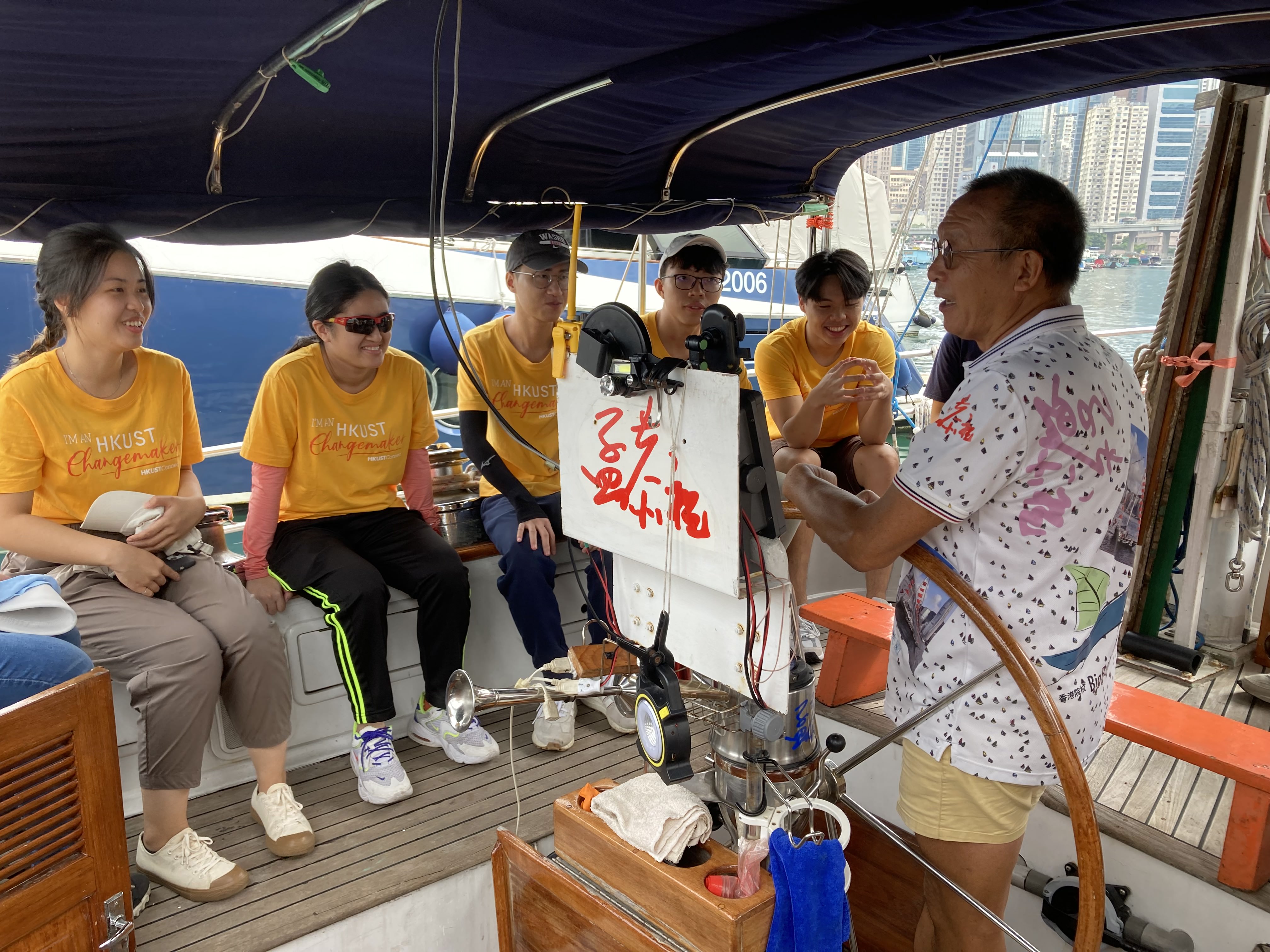 The skipper of Manggongzhu Andy (right) has been involved in sailing for over 40 years. He hopes to share his experience with young people and broaden their horizons.  