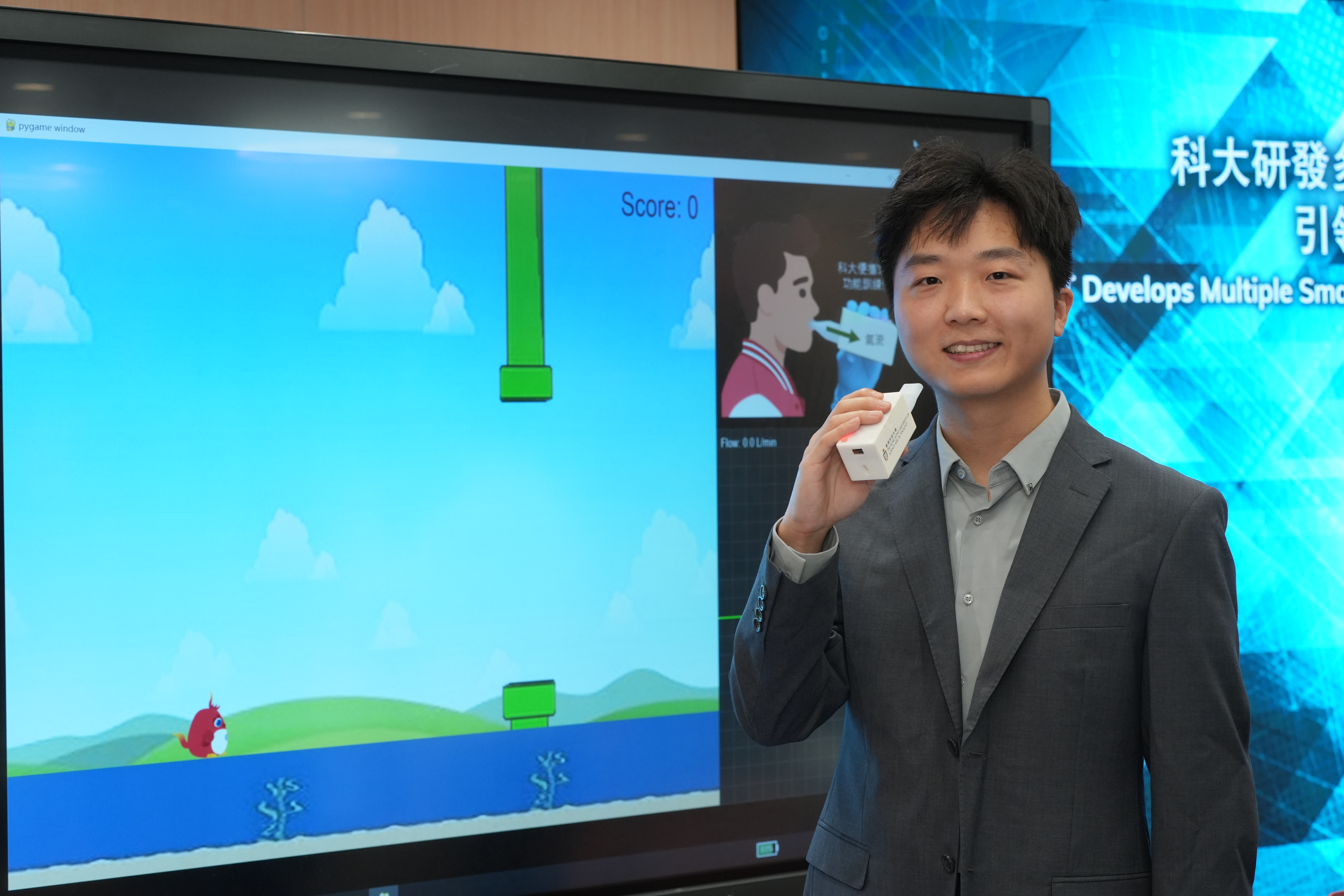 Mr. Ren Hao demonstrates the use of the portable wireless spirometer device.