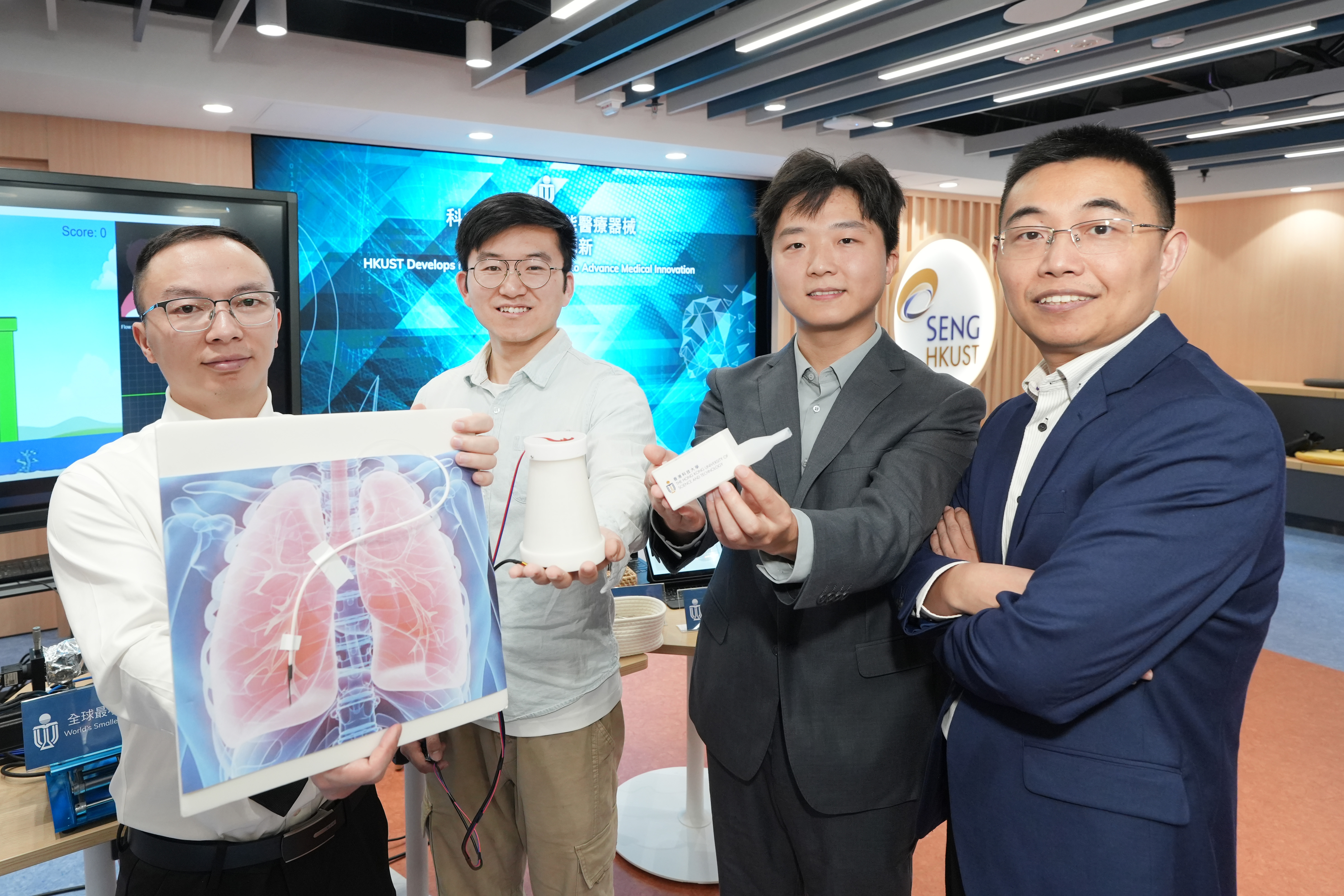 Group photo of Prof. SHEN Yajing (first right) and his research team: Dr. ZHANG Tieshan (first left), Mr. TANG Yifeng (second left) and Mr. REN Hao (second right).