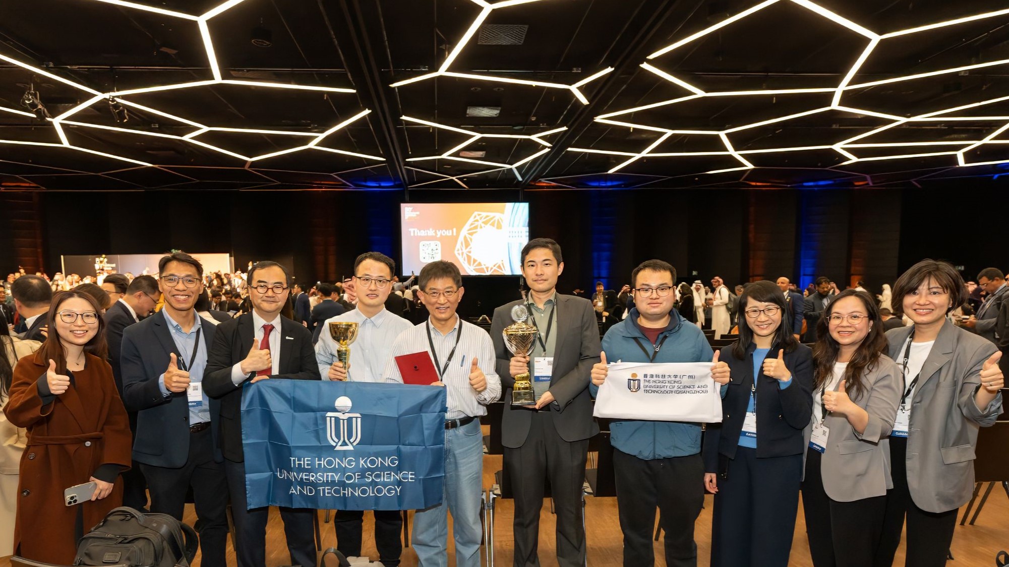 Two research teams led by Prof. SUN Qingping (fifth left) from the Department of Mechanical and Aerospace Engineering and Prof. Hao LIU (fifth right), an HKUST alumnus from the Department of Computer Science and Engineering who is currently an Assistant Professor of the Artificial Intelligence Thrust at HKUST (Guangzhou), win special prizes of the Prize of the Technical University of Cluj-Napoca – Romania and the Swiss Automobile Club Prize – ACS respectively.
