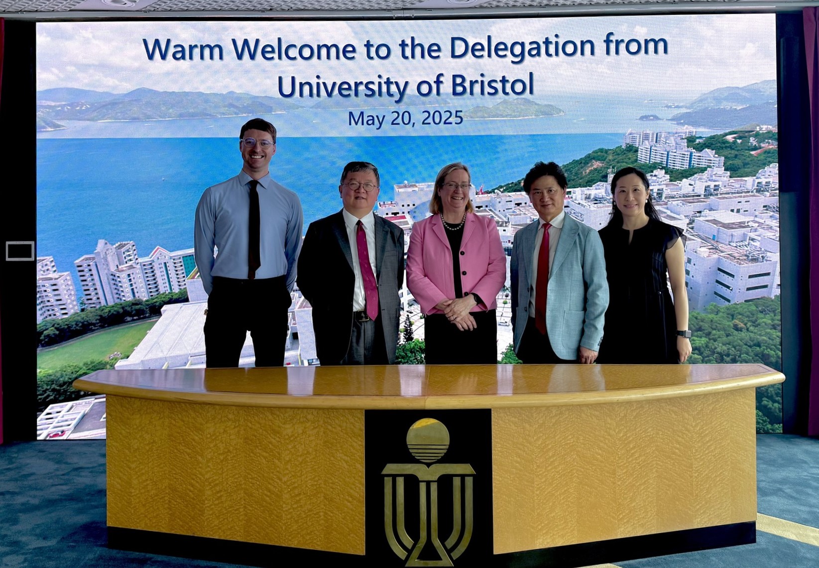 Group photo: HKUST Provost Prof. GUO Yike (second left), University of Bristol Vice-Chancellor and President Prof. Evelyn WELCH (middle), HKUST (Guangzhou) Vice-President and Dean of HKUST Fok Ying Tung Graduate School Prof. Charles NG (second right), University of Bristol Director of Global Partnerships Michael BENSON (first left) and HKUST Head of Global Engagement and Greater China Affairs Yvonne LI (first right).
