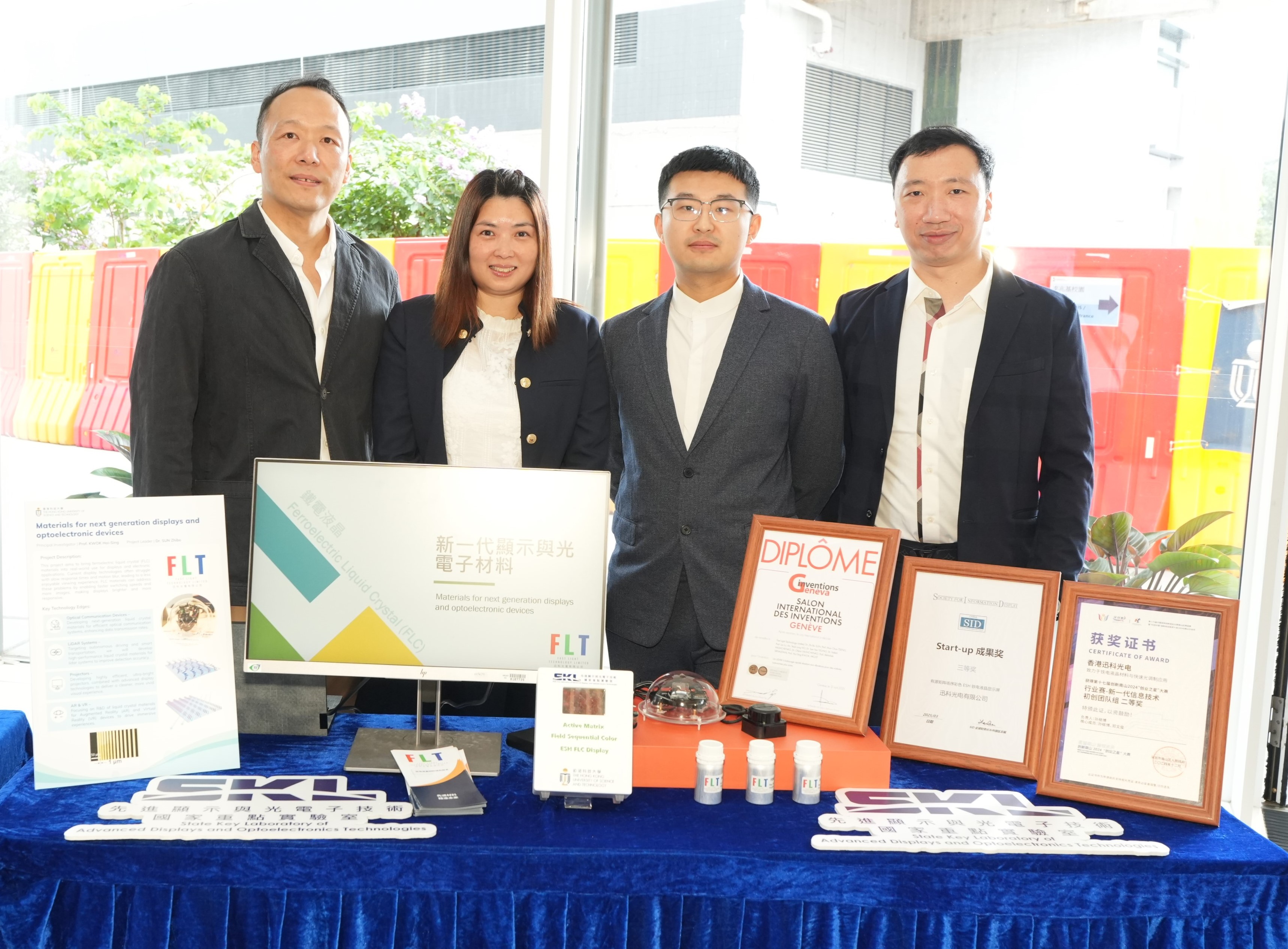 Project 5: “Materials for next generation displays and optoelectronic devices”. Principal Investigator is Prof. KWOK Hoi-Sing, Executive Director of State Key Laboratory of Advanced Displays and Optoelectronics Technologies & Visiting Professor of Department of Electronic and Computer Engineering at HKUST. A group photo of his team members from the HKUST spin-off company Fast Light Technology Ltd, including Prof. Ken TSENG, R&D Director (first right); Chief Technical Officer Dr. SUN Zhibo (second right), Ad