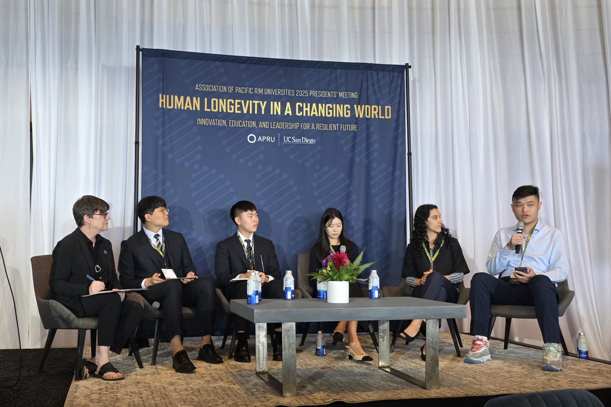 HKUST student Karl YU (first right) shares his insights at the student panel during the APRU APM.