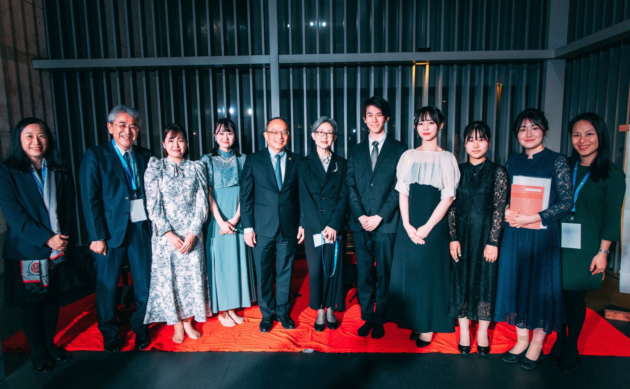 Group photo of Prof. Tim CHENG (fifth left) with The University of Tokyo Executive Vice President Prof. Kaori HAYASHI (center) and student performers at The University of Tokyo.