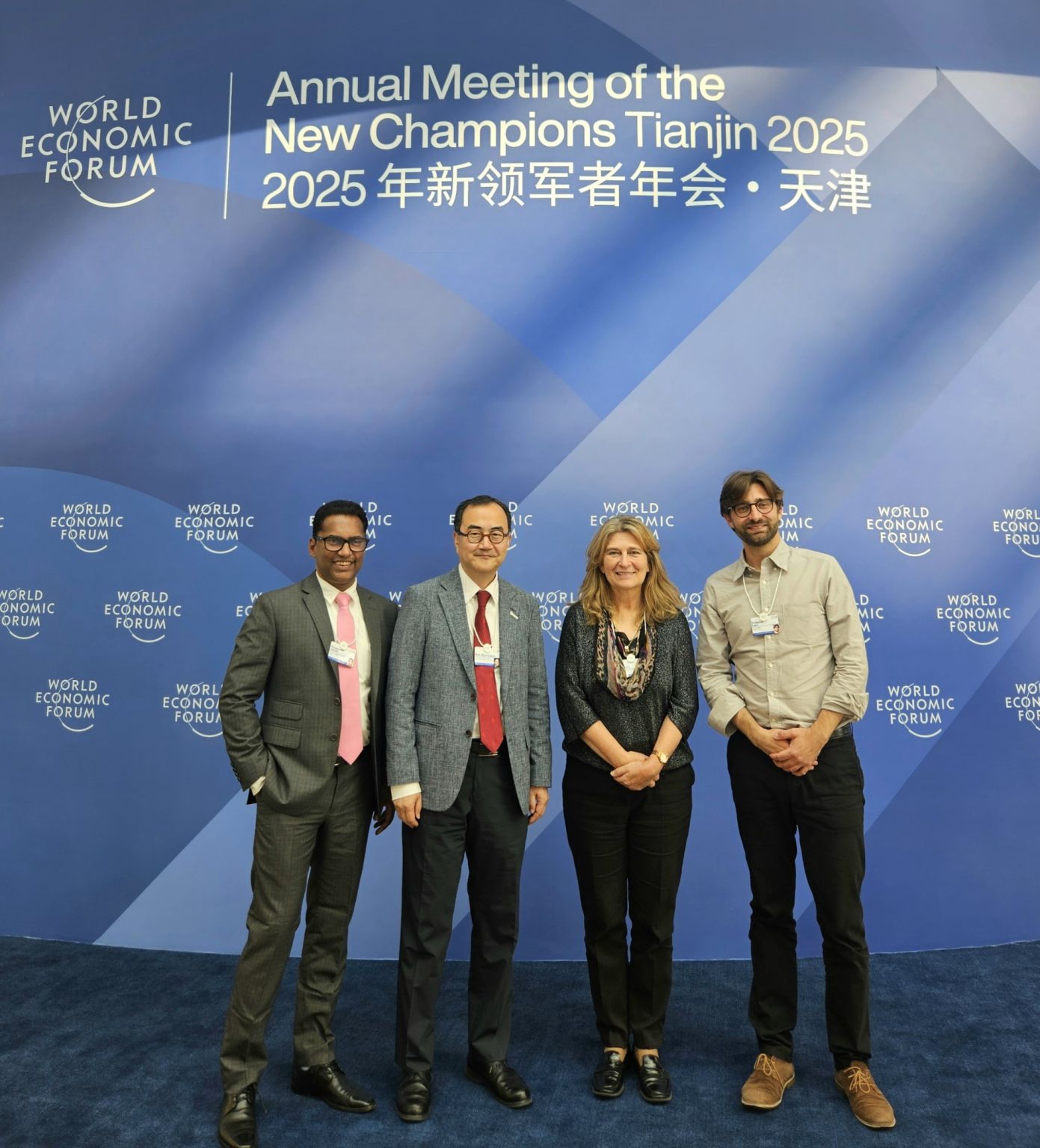 Dr. KIM Shin Cheul (second left) with other attendees at the World Economic Forum Annual Meeting of the New Champions 2025.