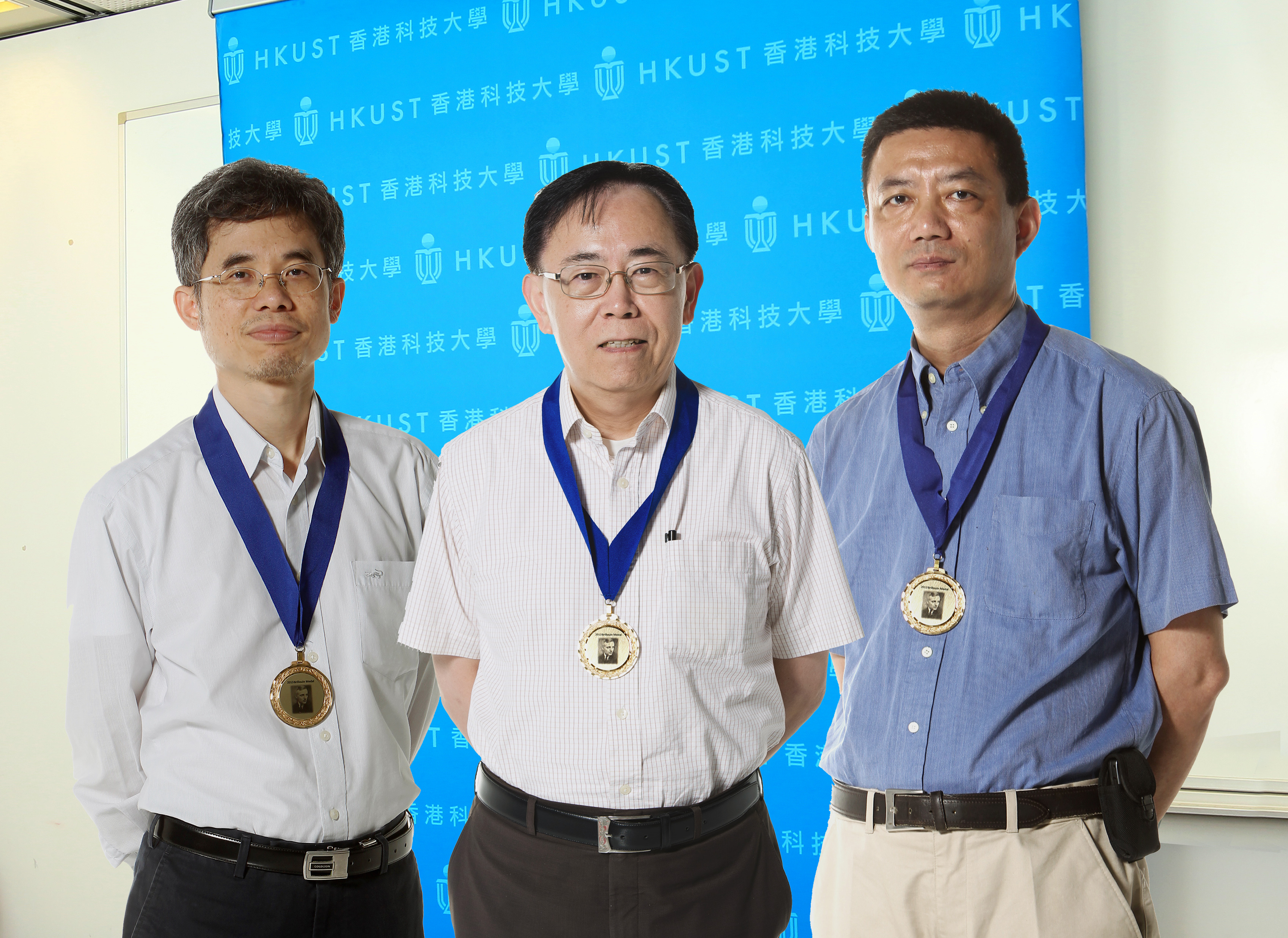 (From left) Prof Che-ting Chan, Prof Ping Sheng and Prof Jason Yang with their medals.