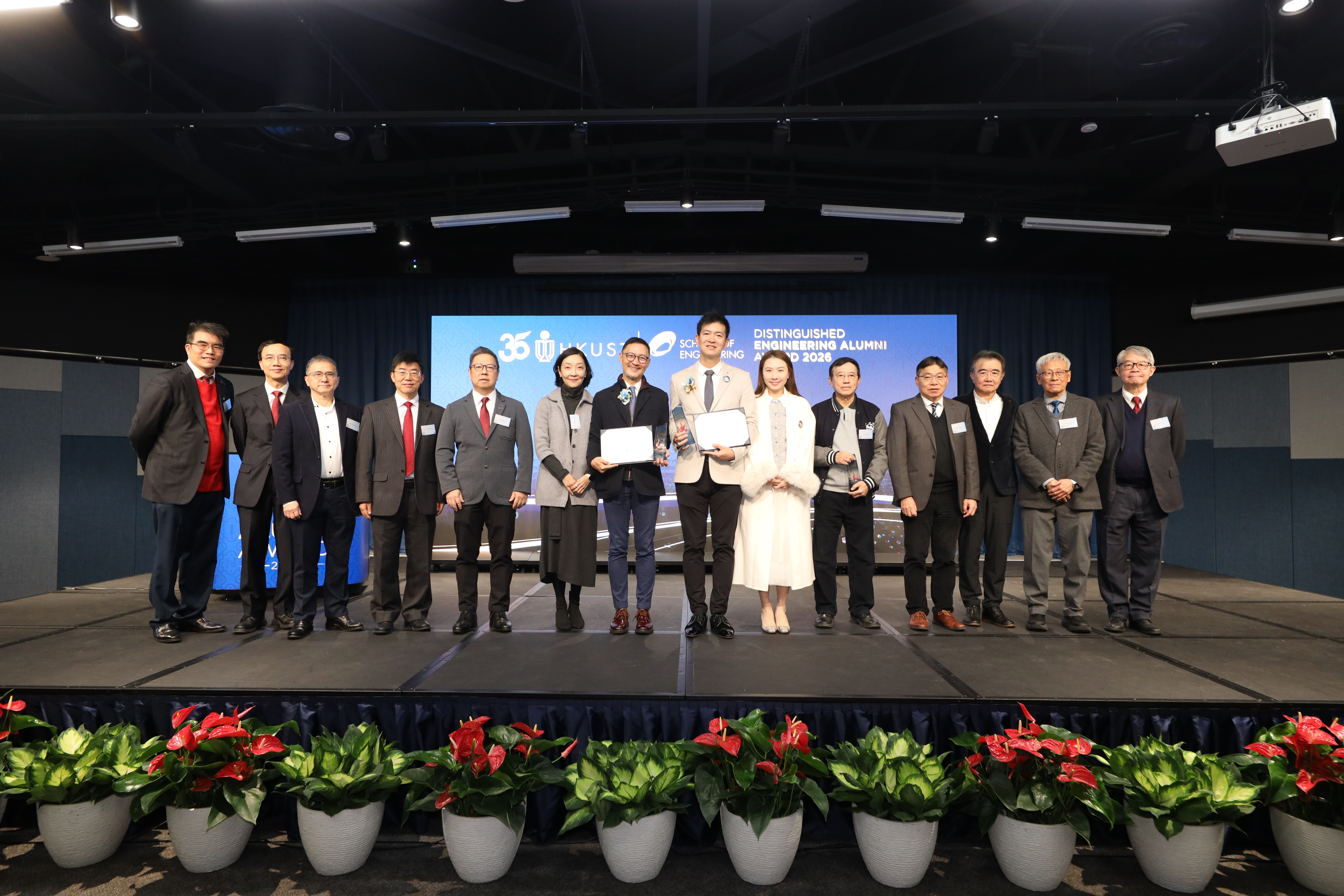 Dr. Jack LAU (seventh left), Mr. Terry TSANG (seventh right) and Mr. Frank WANG are the inaugural recipients of HKUST’s Distinguished Engineering Alumni Award. Also pictured are Mrs. LAU (sixth left), Mrs. TSANG (sixth right), Prof. Jimmy FUNG (second left), Prof. Hong K. LO (fifth left), award selection panel members Ir Dr. Andrew CHAN (first right), Prof. Philip CHAN (second right), Prof. Roland CHIN (third right), Ir Prof. LAM Sai-Hung (fourth right) and Prof. Ping KO (fifth right), as well as citation o