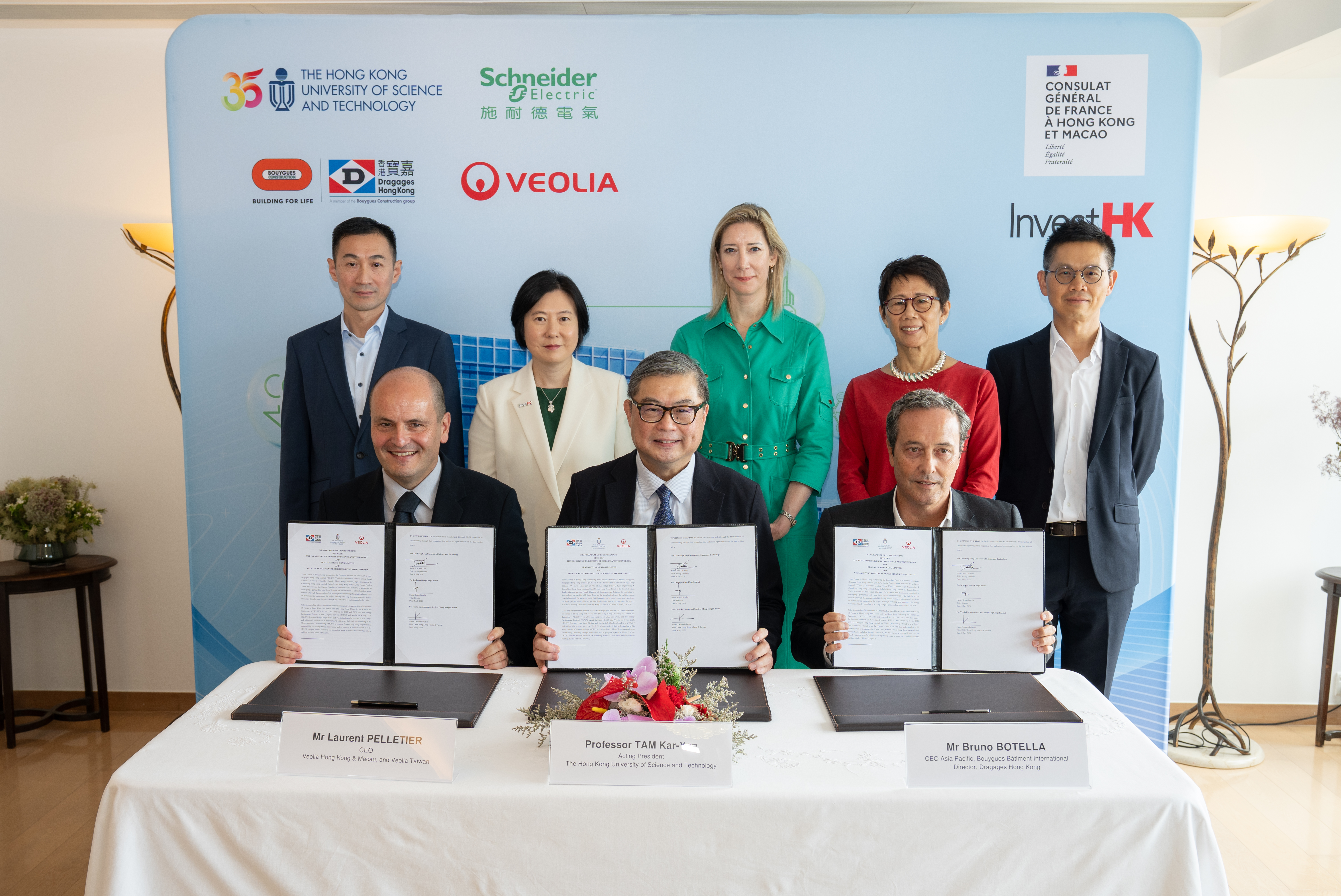 HKUST and a consortium of leading French corporations today signed a works contract and a second-phase MoU. Welcomed by InvestHK, the two agreements mark a significant step forward and turn the low-carbon retrofit partnership established in September 2025 into concrete action.  Photo shows the first works contract signed by Prof. TAM Kar-yan, Acting President of HKUST (centre, front row); Mr. Bruno BOTELLA, the Chief Executive Officer Asia Pacific of Bouygues-Dragages (right, front row); and Mr. Laurent PEL