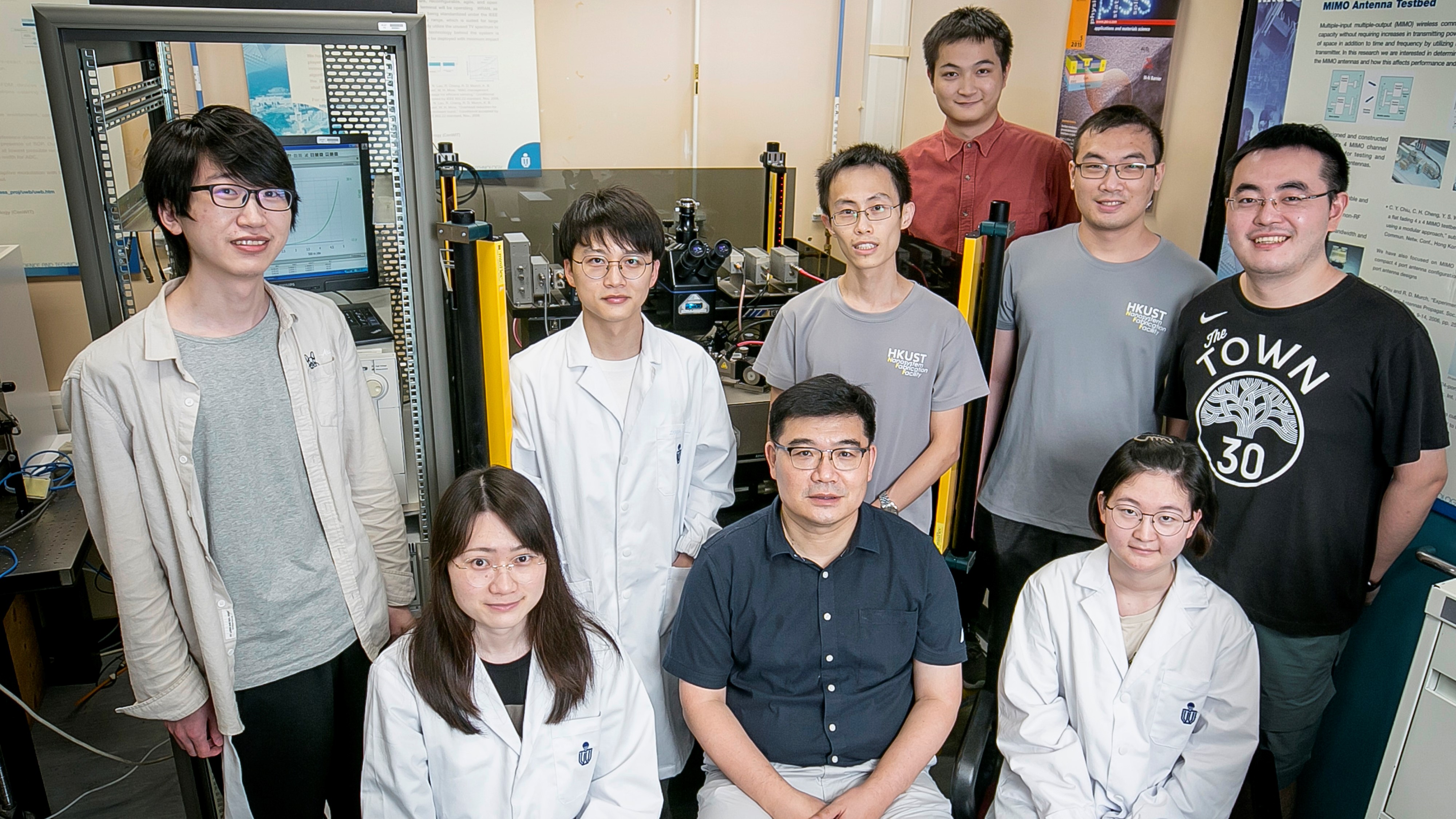 Prof. Kevin J. Chen (front middle), Professor of HKUST’s Department of Electronic and Computer Engineering, and his team that developed this work.